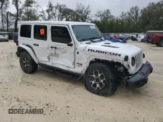 2022 Jeep Wrangler Unlimited Rubicon with VIN 1C4HJXFNXNW133624, listed as a Copart auction lot 48222615 with 51,849 mi miles and Salvage title. Bid and sale history available at DreamBid. Image 4.