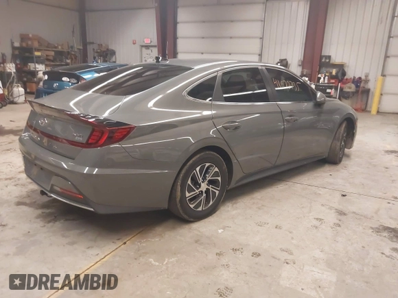 2022 Hyundai Sonata Hybrid Blue with VIN KMHL24JJ3NA048305, listed as a IAAI auction lot 41572735 with 88,085 mi miles. Bid and sale history available at carsss.com. Image 4.