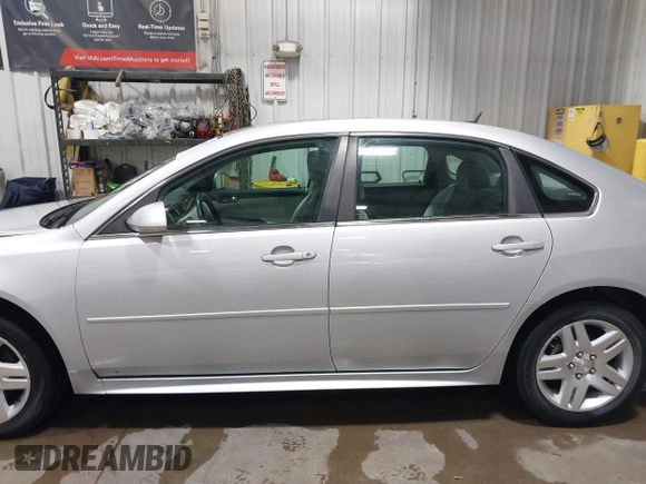 2014 Chevrolet Impala LT with VIN 2G1WB5E37E1178089, listed as a IAAI auction lot 42450127 with 58,277 mi miles and . Bid and sale history available at DreamBid. Image 14.
