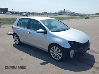 2014 Volkswagen Golf TDI w/Sunroof & Nav z VIN WVWNM7AJ9EW007463, wystawiony jako IAAI lot #42211804 z przebiegiem 62 381 mil mil oraz . Historia ofert i sprzedaży dostępna na DreamBid. Obrazek 1.