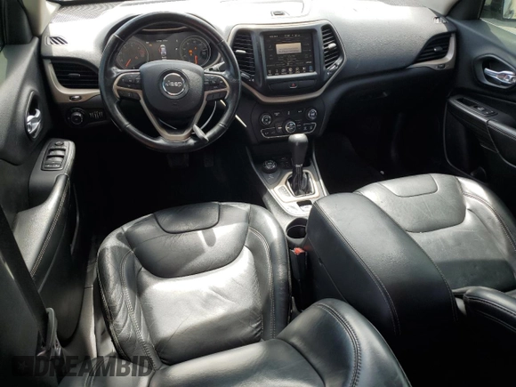2016 Jeep Cherokee Limited with VIN 1C4PJMDB5GW244734, listed as a Copart auction lot 64608765 with 166,953 mi miles and Salvage title. Bid and sale history available at DreamBid. Image 8.
