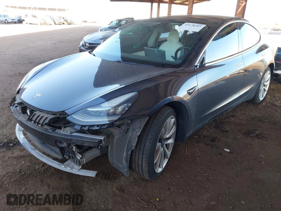 2018 Tesla Model 3 Long Range Battery with VIN 5YJ3E1EA3JF169132, listed as a IAAI auction lot 41678383 with 170,809 mi miles and . Bid and sale history available at DreamBid. Image 2.