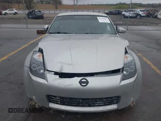 2003 Nissan 350Z Touring z VIN JN1AZ34E43T014247, wystawiony jako IAAI lot #42120812 z przebiegiem 112 263 mil mil oraz . Historia ofert i sprzedaży dostępna na DreamBid. Obrazek 12.