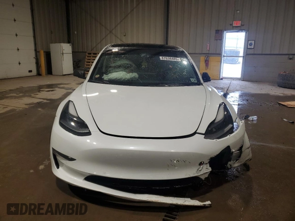 2021 Tesla Model 3 Standard Range Plus with VIN 5YJ3E1EA5MF987000, listed as a Copart auction lot 87638485 with Not Provided miles and Salvage Title. Bid and sale history available at DreamBid. Image 5.