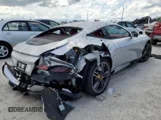 2022 Ferrari Roma z VIN ZFF98RNA1N0279070, wystawiony jako Copart lot #61832983 z przebiegiem Nie podano mil oraz Szkody całkowita. Historia ofert i sprzedaży dostępna na DreamBid. Obrazek 3.