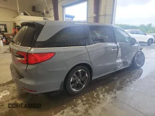 2023 Honda Odyssey Elite with VIN 5FNRL6H90PB071988, listed as a Copart auction lot 58589585 with 12,998 mi miles and Salvage title. Bid and sale history available at DreamBid. Image 3.