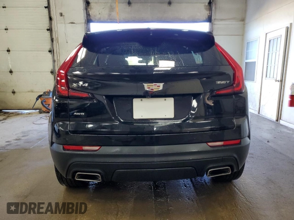 2022 Cadillac XT4 AWD Luxury with VIN 1GYFZBR45NF145986, listed as a Copart auction lot 79198274 with 23,477 mi miles and Salvage Title. Bid and sale history available at carsss.com. Image 6.