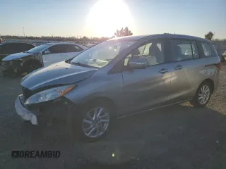 2015 Mazda 5 Sport with VIN JM1CW2BL1F0189846, listed as a Copart auction lot 41448545 with 157,070 mi miles and Salvage Title. Bid and sale history available at DreamBid. Image 1.