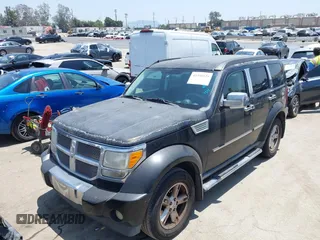 2007 Dodge Nitro SLT z VIN 1D8GT58K27W578490, wystawiony jako IAAI lot #42335125 z przebiegiem 125 826 mil mil oraz . Historia ofert i sprzedaży dostępna na DreamBid. Obrazek 6.