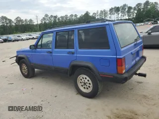 1996 Jeep Cherokee Sport z VIN 1J4FT68S8TL128381, wystawiony jako Copart lot #57496175 z przebiegiem 221 330 mil mil oraz Szkoda całkowita • Salvage title. Historia ofert i sprzedaży dostępna na DreamBid. Obrazek 2.