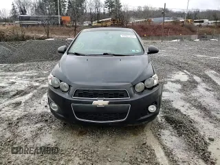 2014 Chevrolet Sonic LTZ with VIN 1G1JE5SB8E4213028, listed as a Copart auction lot 43561105 with 81,457 mi miles and Salvage Title. Bid and sale history available at carsss.com. Image 10.