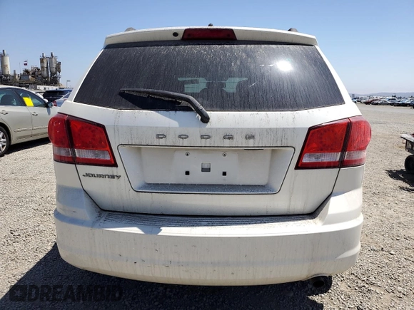 2013 Dodge Journey American Value with VIN 3C4PDCAB2DT547459, listed as a Copart auction lot 61217605 with 116,740 mi miles and Clean title. Bid and sale history available at DreamBid. Image 6.