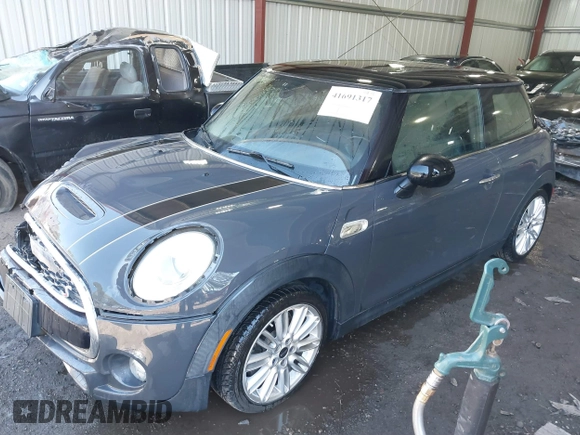 2014 MINI Hardtop S z VIN WMWXM7C50ET731680, wystawiony jako IAAI lot #41691317 z przebiegiem 47 205 mil mil oraz . Historia ofert i sprzedaży dostępna na DreamBid. Obrazek 2.