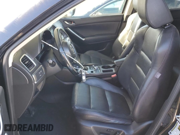 2016 Mazda CX-5 Grand Touring with VIN JM3KE4DY6G0655802, listed as a Copart auction lot 43820475 with 76,639 mi miles and Salvage Title. Bid and sale history available at carsss.com. Image 7.