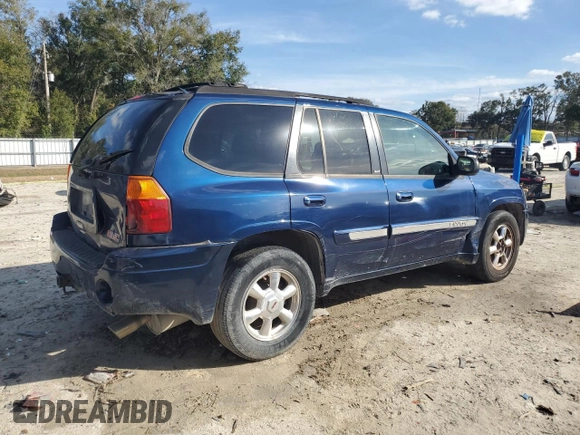 2004 GMC Envoy SLT with VIN 1GKDS13S042311327, listed as a Copart auction lot 42736995 with 235,164 mi miles and Salvage Title. Bid and sale history available at carsss.com. Image 3.