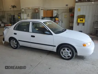 1999 Chevrolet Prizm z VIN 1Y1SK5281XZ429846, wystawiony jako Copart lot #56907955 z przebiegiem 90 581 mil mil oraz Szkoda całkowita • Salvage title. Historia ofert i sprzedaży dostępna na DreamBid. Obrazek 4.