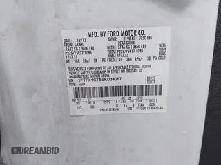 2014 Ford F-150 XL with VIN 1FTFX1CT5EKD34067, listed as a IAAI auction lot 42290888 with 214,507 mi miles and . Bid and sale history available at DreamBid. Image 9.