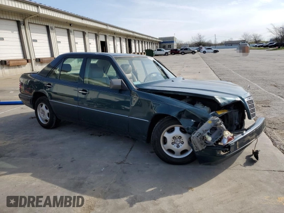 1995 Mercedes-Benz E Class with VIN WDBEA32E1SC242552, listed as a Copart auction lot 52433285 with 211,669 mi miles and Salvage Title. Bid and sale history available at carsss.com. Image 4.