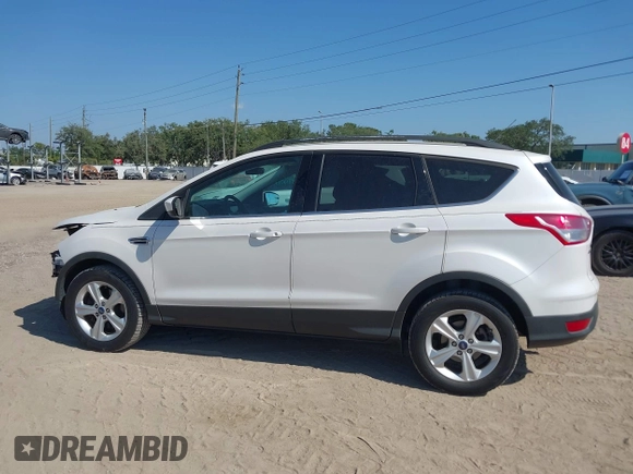 2014 Ford Escape SE with VIN 1FMCU0G94EUA35464, listed as a IAAI auction lot 42046944 with 88,504 mi miles. Bid and sale history available at carsss.com. Image 15.