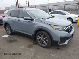 2022 Honda CR-V Touring z VIN 2HKRW2H90NH600337, wystawiony jako IAAI lot #42058488 z przebiegiem 60 556 mil mil oraz . Historia ofert i sprzedaży dostępna na DreamBid. Obrazek 1.