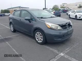 2013 Kia Rio SX with VIN KNADN4A33D6294075, listed as a IAAI auction lot 41728082 with 119,297 mi miles. Bid and sale history available at carsss.com. Image 1.