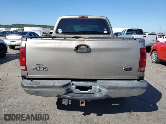 2003 Ford F-350 XL with VIN 1FTSW30F83EA84699, listed as a Copart auction lot 72604414 with Not Provided miles and Salvage Title. Bid and sale history available at DreamBid. Image 6.