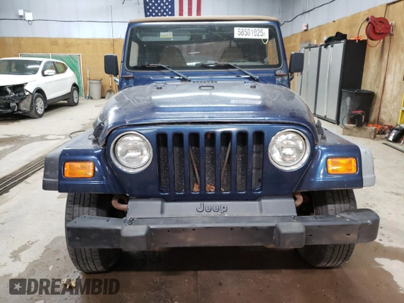 2000 Jeep Wrangler SE with VIN 1J4FA29P1YP739555, listed as a Copart auction lot 58501025 with 128,458 mi miles and Clean title. Bid and sale history available at DreamBid. Image 5.