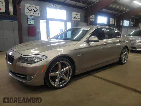 2013 BMW 5 Series 535i xDrive with VIN WBAFU7C57DDU74909, listed as a Copart auction lot 64053715 with 115,521 mi miles and Clean title. Bid and sale history available at DreamBid. Image 1.