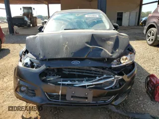 2016 Ford Fusion Titanium z VIN 3FA6P0K98GR151640, wystawiony jako Copart lot #73254594 z przebiegiem 145 473 mil mil oraz Szkoda całkowita • Salvage title. Historia ofert i sprzedaży dostępna na DreamBid. Obrazek 5.
