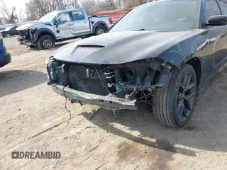 2020 Dodge Charger R/T with VIN 2C3CDXCTXLH145129, listed as a IAAI auction lot 41769766 with 56,213 mi miles and . Bid and sale history available at carsss.com. Image 6.