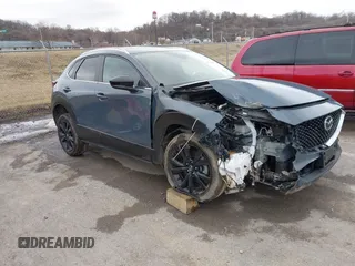 2022 Mazda CX-30 2.5 S Preferred Package with VIN 3MVDMBCL1NM421686, listed as a IAAI auction lot 41525626 with 63,000 mi miles. Bid and sale history available at carsss.com. Image 1.