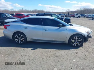 2016 Nissan Maxima SV z VIN 1N4AA6AP4GC446635, wystawiony jako IAAI lot #41672861 z przebiegiem 118 377 mil mil oraz . Historia ofert i sprzedaży dostępna na DreamBid. Obrazek 14.