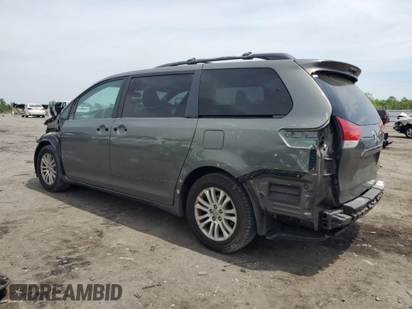 2011 Toyota Sienna XLE AAS with VIN 5TDYK3DC6BS124373, listed as a Copart auction lot 54265975 with 213,798 mi miles and Clean Title. Bid and sale history available at carsss.com. Image 2.