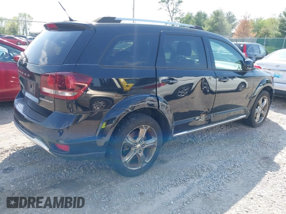 2015 Dodge Journey Crossroad with VIN 3C4PDDGG8FT633483, listed as a IAAI auction lot 42132925 with 138,235 mi miles and . Bid and sale history available at DreamBid. Image 4.