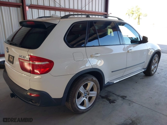 2007 BMW X5 3.0si with VIN 5UXFE43507L018015, listed as a IAAI auction lot 41880668 with 150,329 mi miles. Bid and sale history available at carsss.com. Image 4.