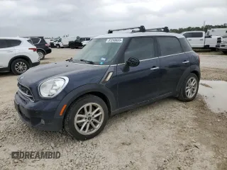 2015 MINI Countryman S z VIN WMWZC3C51FWT05016, wystawiony jako Copart lot #51245655 z przebiegiem 63 463 mil mil oraz Tytuł czysty. Historia ofert i sprzedaży dostępna na DreamBid. Obrazek 1.