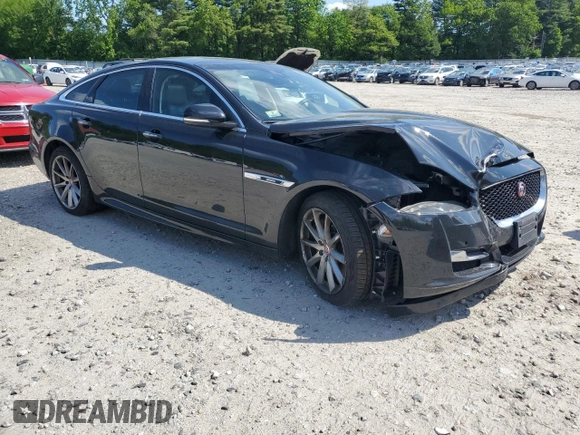2016 Jaguar XJ R-Sport z VIN SAJWJ1CD8G8V95608, wystawiony jako Copart lot #59103615 z przebiegiem 119 066 mil mil oraz Szkoda całkowita • Salvage title. Historia ofert i sprzedaży dostępna na DreamBid. Obrazek 4.