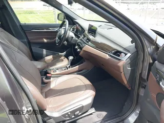 2017 BMW X1 xDrive28i with VIN WBXHT3Z38H4A55086, listed as a IAAI auction lot 42459276 with 101,907 mi miles and . Bid and sale history available at DreamBid. Image 5.