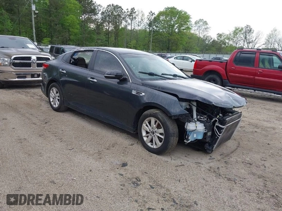 2016 Kia Optima LX with VIN 5XXGT4L38GG023697, listed as a IAAI auction lot 41976461 with 131,023 mi miles. Bid and sale history available at carsss.com. Image 1.