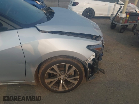 2018 Nissan Maxima SV z VIN 1N4AA6AP1JC366927, wystawiony jako IAAI lot #42394242 z przebiegiem 89 093 mil mil oraz . Historia ofert i sprzedaży dostępna na DreamBid. Obrazek 18.