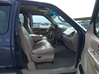 2000 Ford F-150 XL with VIN 1FTRX17L2YNB85627, listed as a IAAI auction lot 41377814 with 123,740 mi miles. Bid and sale history available at carsss.com. Image 5.