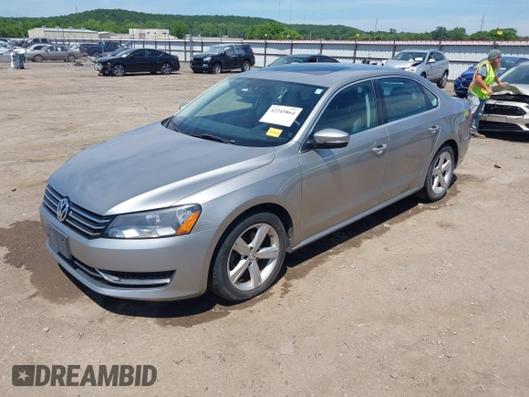 2013 Volkswagen Passat SE with VIN 1VWBP7A37DC140683, listed as a IAAI auction lot 42245864 with 125,898 mi miles and . Bid and sale history available at DreamBid. Image 2.