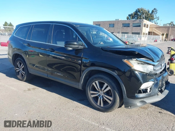 2018 Honda Pilot EX-L with VIN 5FNYF5H58JB013113, listed as a IAAI auction lot 41313206 with 125,825 mi miles. Bid and sale history available at carsss.com. Image 1.