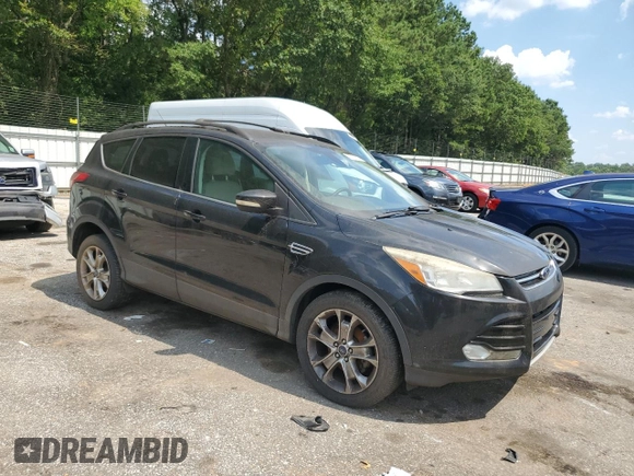 2013 Ford Escape SEL with VIN 1FMCU0HX6DUB66021, listed as a Copart auction lot 63814635 with 129,691 mi miles and Clean title. Bid and sale history available at DreamBid. Image 4.