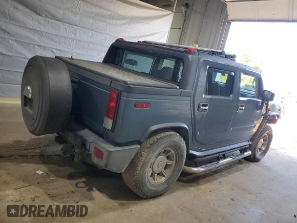 2006 Hummer H2 z VIN 5GRGN22U46H109632, wystawiony jako Copart lot #58478605 z przebiegiem 180 047 mil mil oraz Szkody całkowita. Historia ofert i sprzedaży dostępna na DreamBid. Obrazek 3.