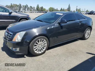 2013 Cadillac CTS Performance z VIN 1G6DK1E39D0157877, wystawiony jako Copart lot #64521825 z przebiegiem 115 385 mil mil oraz Szkoda całkowita • Salvage title. Historia ofert i sprzedaży dostępna na DreamBid. Obrazek 1.