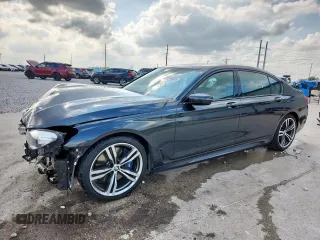 2019 BMW 7 Series 740i with VIN WBA7E2C55KB217485, listed as a Copart auction lot 59940405 with 43,957 mi miles and Salvage title. Bid and sale history available at DreamBid. Image 1.
