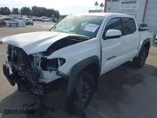 2022 Toyota Tacoma 4WD SR with VIN 3TMCZ5ANXNM528031, listed as a IAAI auction lot 41425832 with 39,760 mi miles. Bid and sale history available at carsss.com. Image 2.