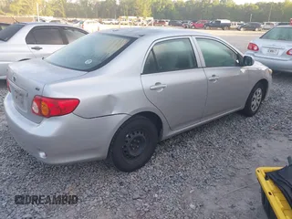 2010 Toyota Corolla with VIN 1NXBU4EE6AZ320115, listed as a IAAI auction lot 42069282 with 183,905 mi miles. Bid and sale history available at carsss.com. Image 4.