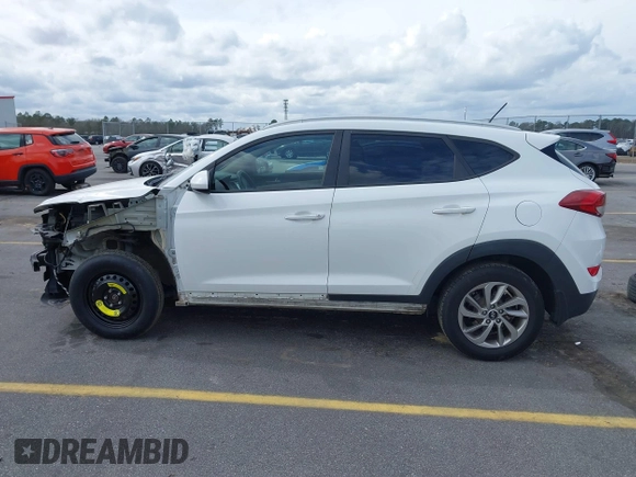 2017 Hyundai Tucson SE with VIN KM8J3CA44HU511581, listed as a IAAI auction lot 41687971 with 111,981 mi miles. Bid and sale history available at carsss.com. Image 15.